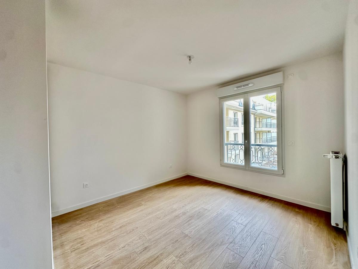 3 pièces - 1er étage - 61m² photo 3