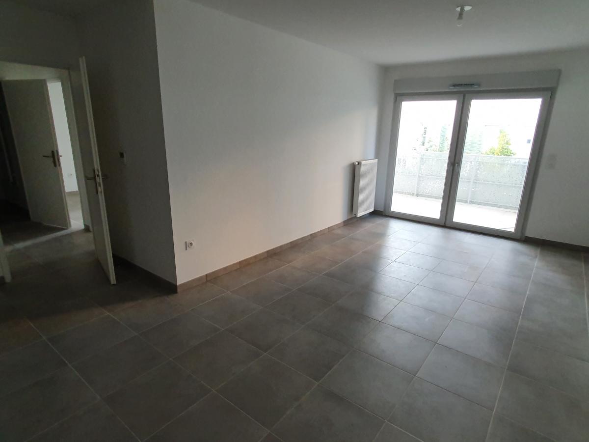 3 pièces - 1er étage - 62m² - 940,38 € - Photo #2