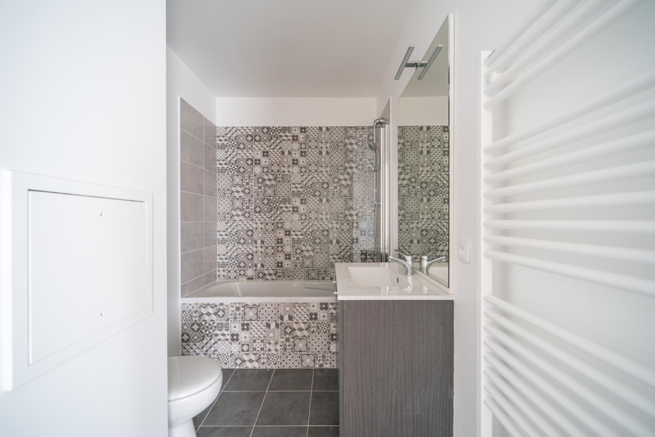 3 pièces - RDC - 82m² photo 4