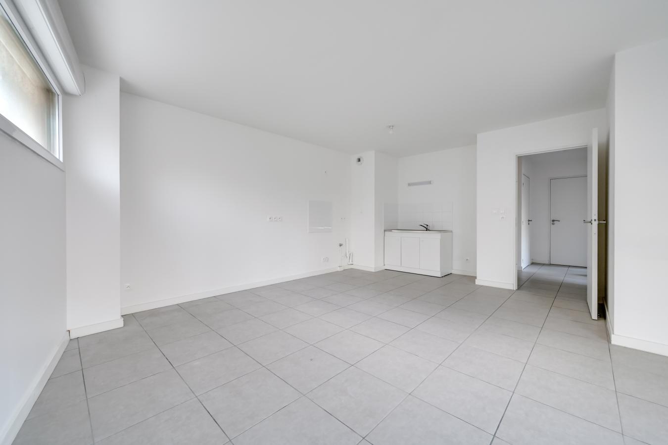 3 pièces - 1er étage - 63m² - 926,86 € - Photo #2