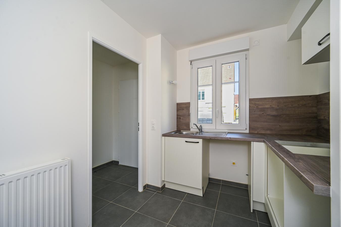 4 pièces - RDC - 87m² - 1 348,28 € - Photo #2