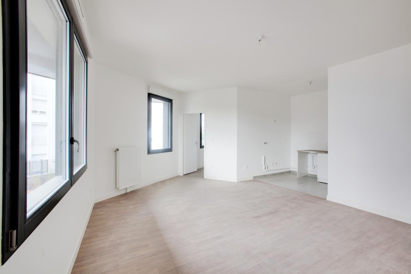 3 pièces - 1er étage - 61m² - 1 615,20 € - Photo #2