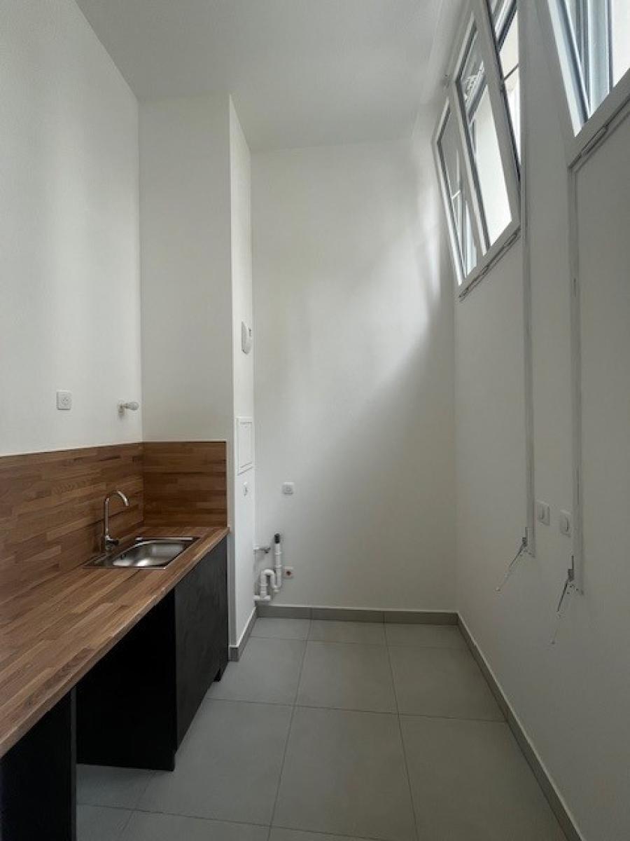 
																			1 pièce - 
																		RDC - 29m² - 1 090,98 € - Photo #7