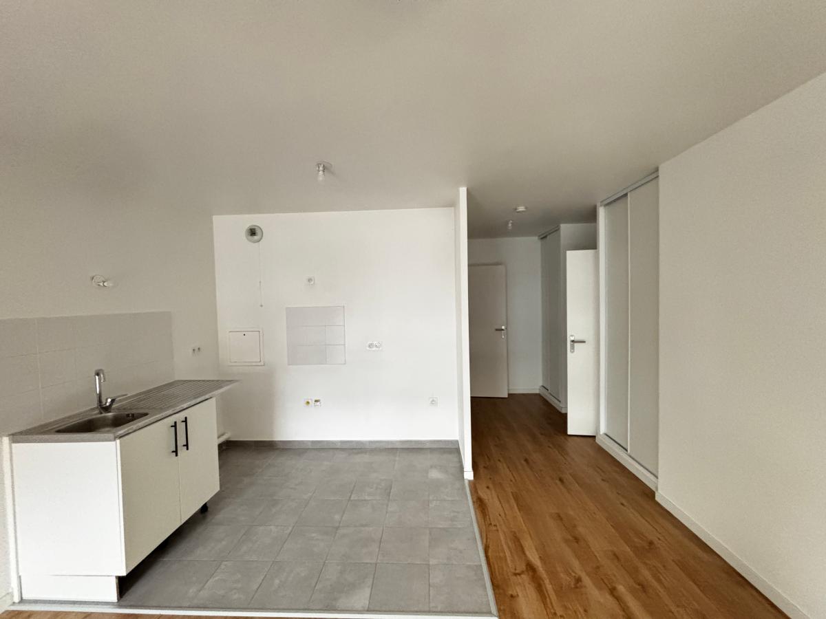 2 pièces - RDC - 57m² - 1 293,06 € - Photo #2